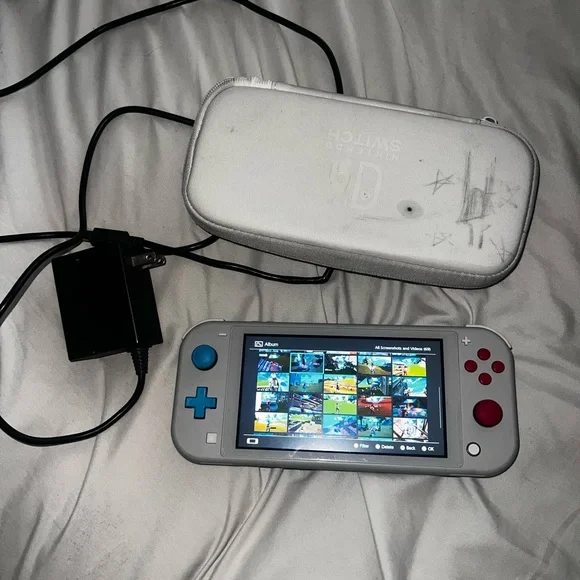 Special Edition 2019 Pokémon Nintendo Switch Lite Gray with Red and Blue Buttons - Picture 7 of 8